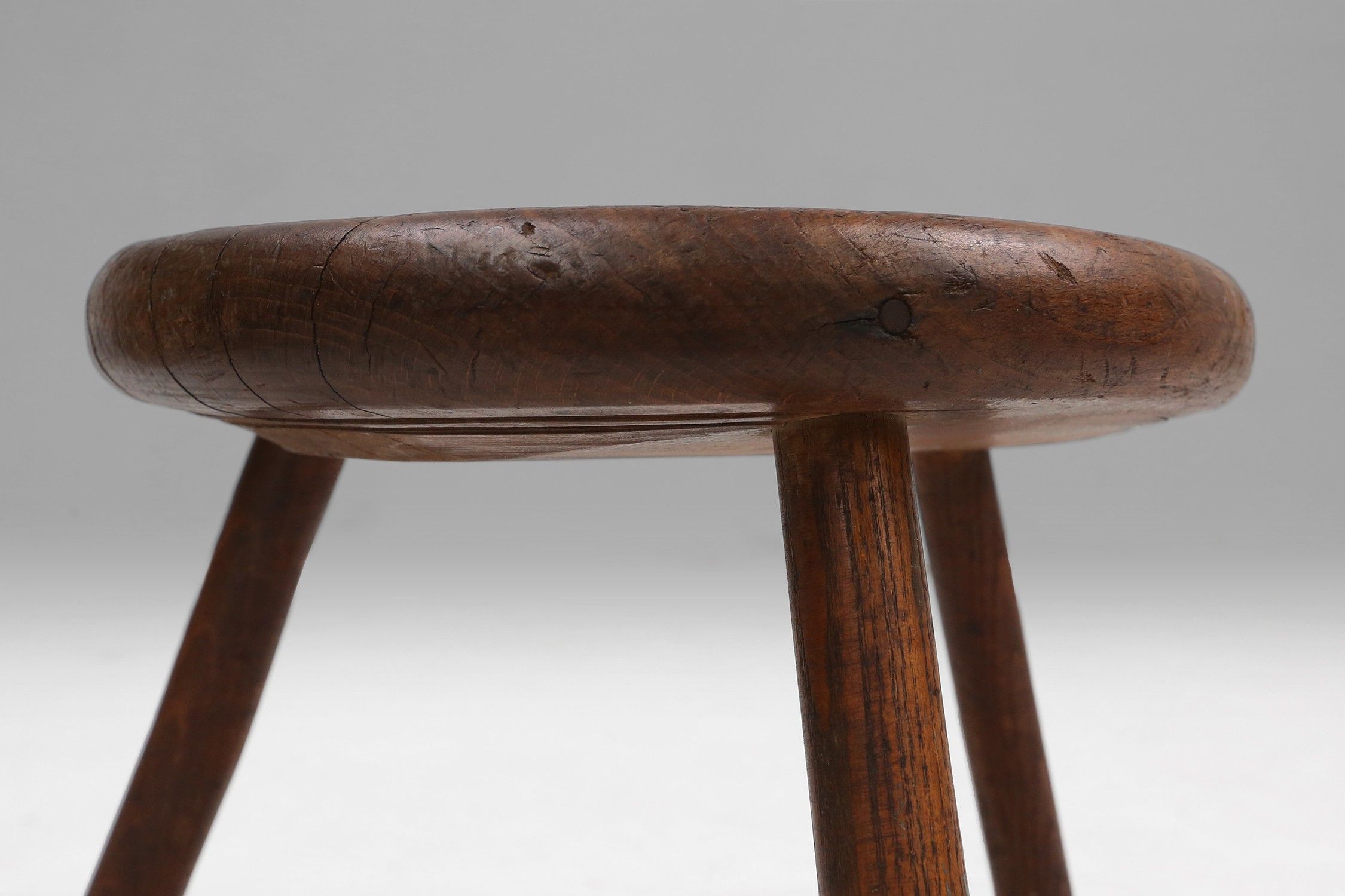 Hand-carved solid wood tripod stool with beautiful patina, France ca. 1900thumbnail